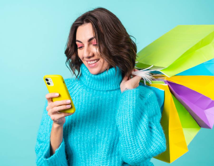 Online shopping on laptop with cart icon - Pexels